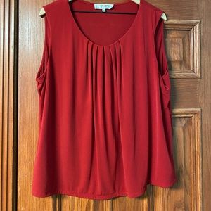 Red sleeveless blouse